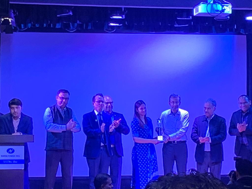 Best Supplier Award from TPDDL. Mr Ganesh Srinivasan, CEO of TPDDL, presents the award to Ms Ankita Pareek, the Key Account Manager at Danish Power
